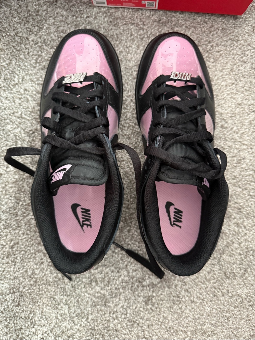 Nike Dunk Low Retro Sneakers in Pink and Black